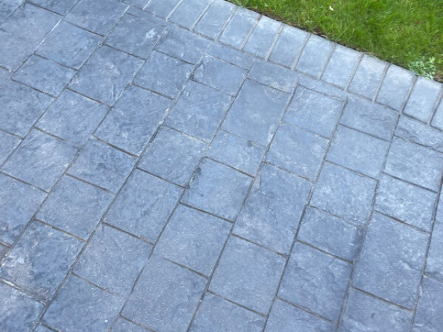Pattern imprinted concrete driveway resealing in Northenden Manchester