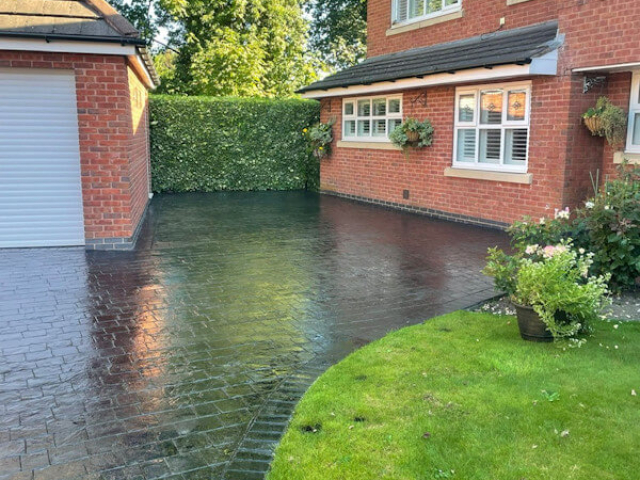 Pattern imprinted concrete driveway resealing in Northenden Manchester