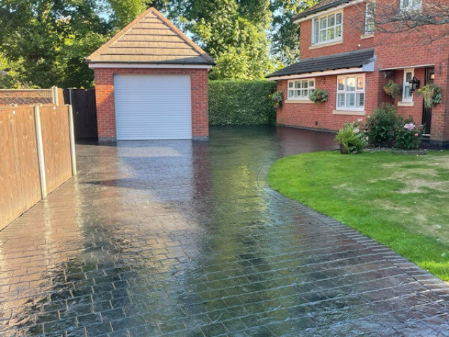 Pattern imprinted concrete driveway resealing in Northenden Manchester