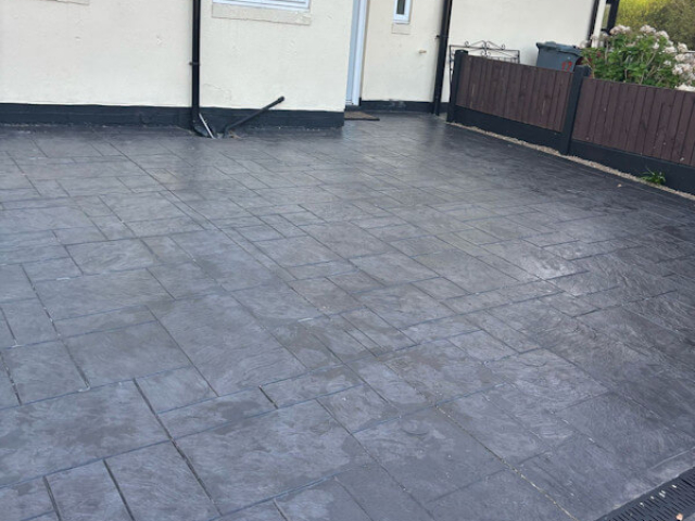 Resealing a pattern imprinted concrete driveway in Wythenshawe