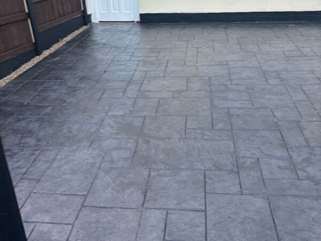 Resealing a pattern imprinted concrete driveway in Wythenshawe